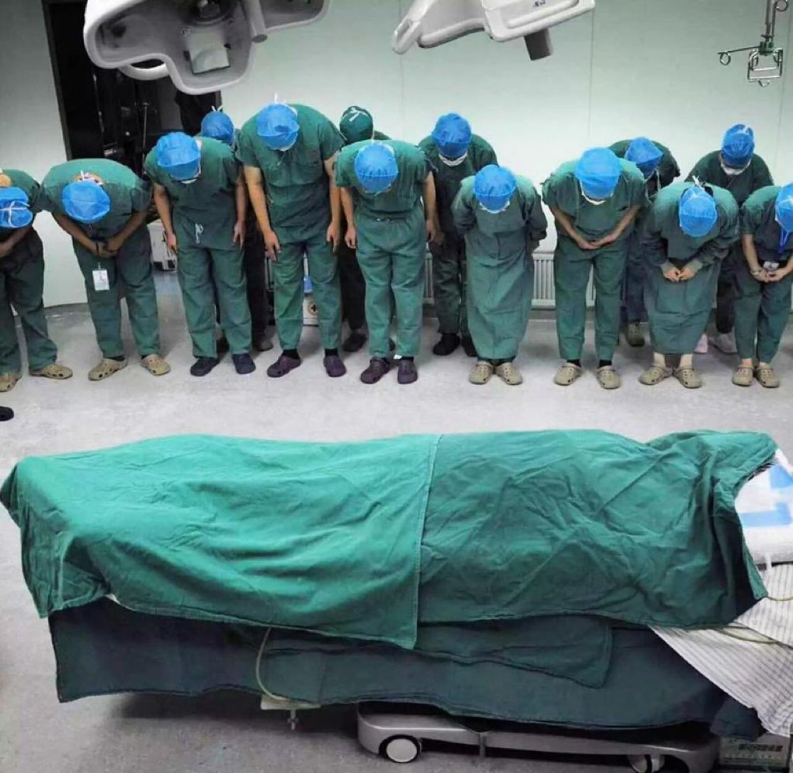 Medical Team Showing Respect to An Organ Donor