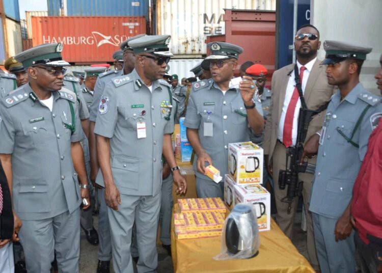 JUST-IN: Nigeria Customs Intercepts 12 Containers With Military, Paramilitary Camouflage